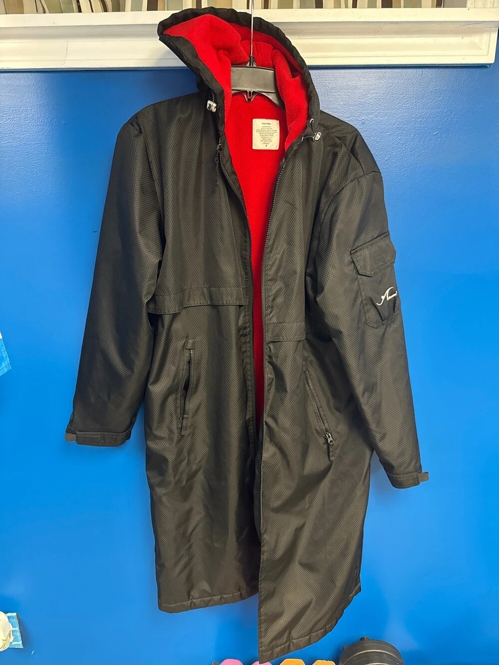 Black water resistant insulated trench coat